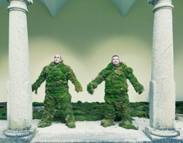 Two men dressed in moss.  The Moss Men of Bejar.