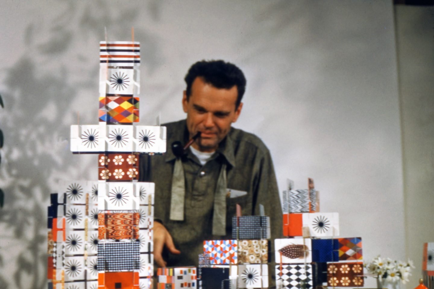 Charles Eames playing with the House of Cards-Pattern Deck-1952-∏-2017 Eames Office-LLC
