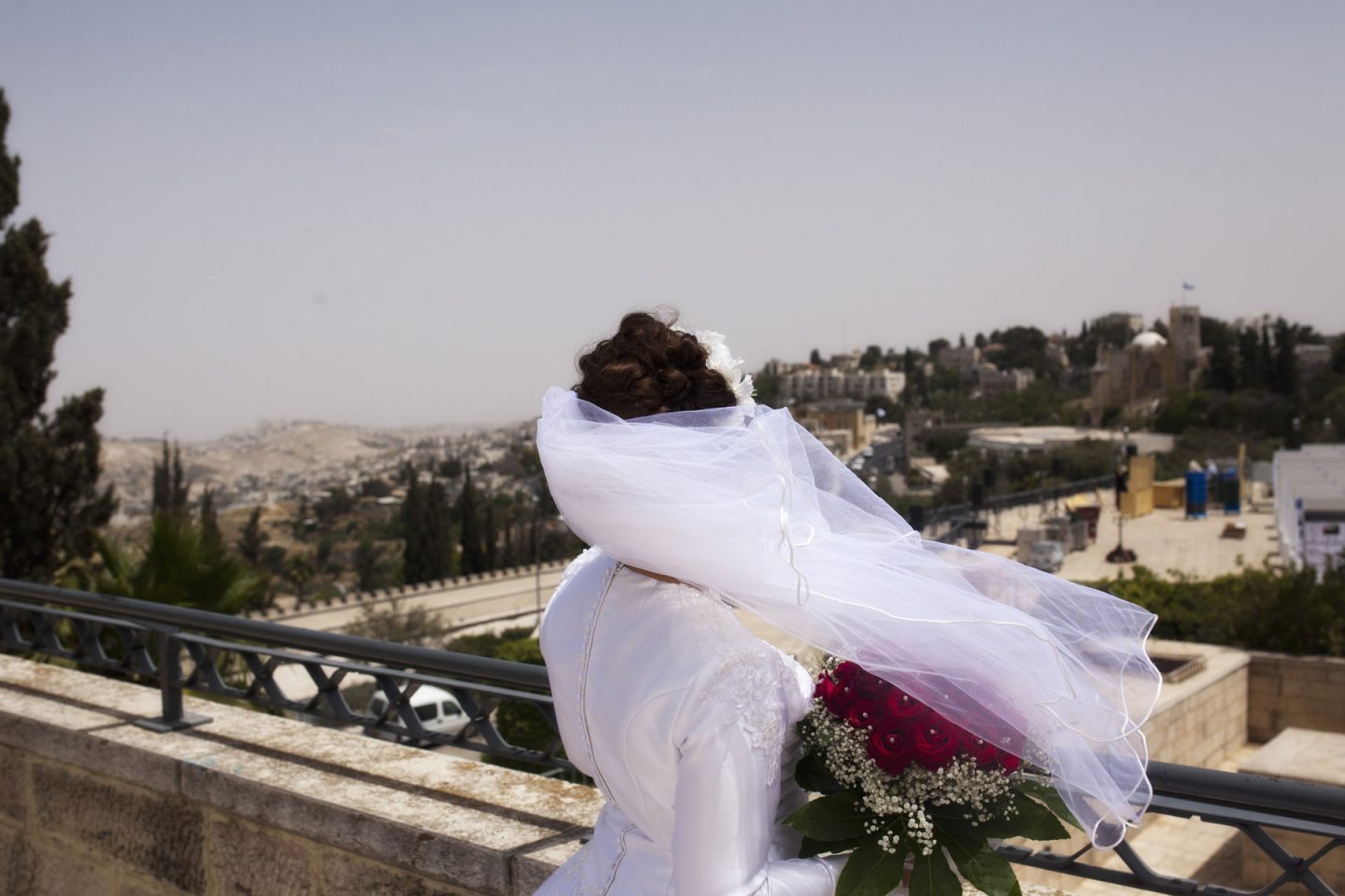 during a portrait session of a bride. In Jerusalem (Israel).