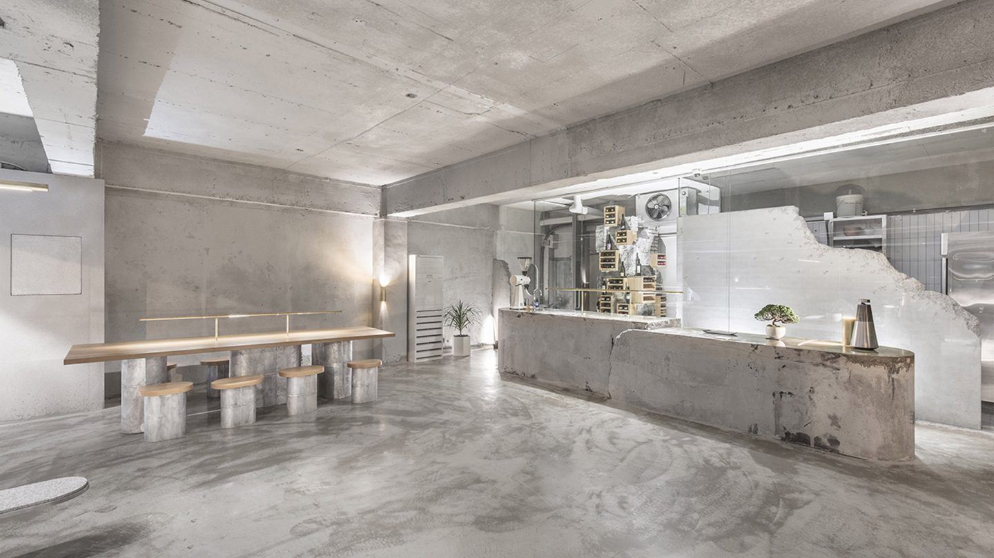 Jeonghwa Seo Designs Furniture For A Rough-Cut Concrete Cafe And Bar In