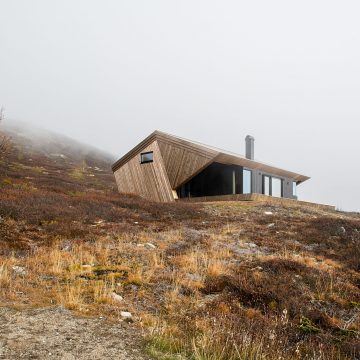 A Robust, Hooded Cabin On Top Of A Mountain Withstands Norway’s Weather ...